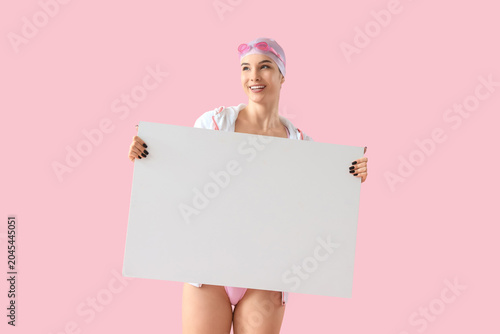 Female swimmer with blank p...