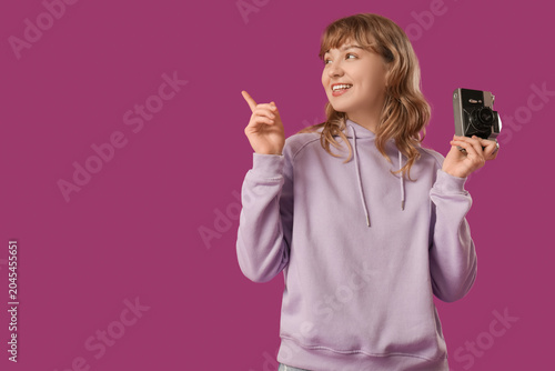 Young woman with photo came...