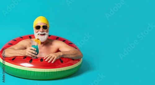 Refreshing summer drinks for a cool you man enjoying a blue cocktail on a watermelon float