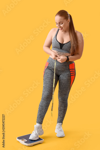 Young overweight woman with...
