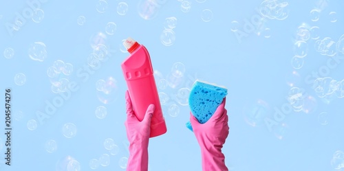 Hands of janitor in rubber ...