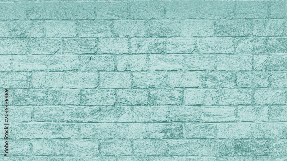 Obraz premium Teal Brick Wall Texture: A close-up view of a teal-colored brick wall, showcasing the weathered texture and classic pattern of the masonry. An ideal backdrop for design projects.
