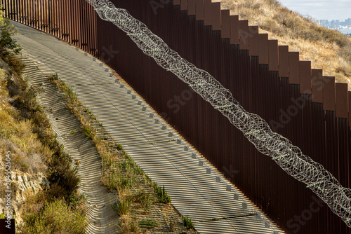 Fotografija Looking down at the international boarder wall from Tijuana Mexico