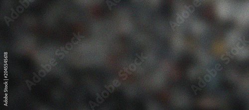Cuadro en lienzo Abstract dark grey grainy texture background with subtle blurry monochrome patte