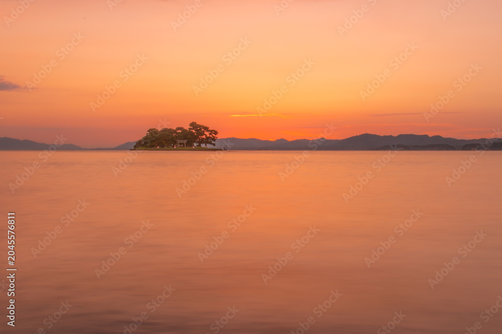Fototapeta premium Sunset over Yomegashima Island on Lake Shinji, Japan