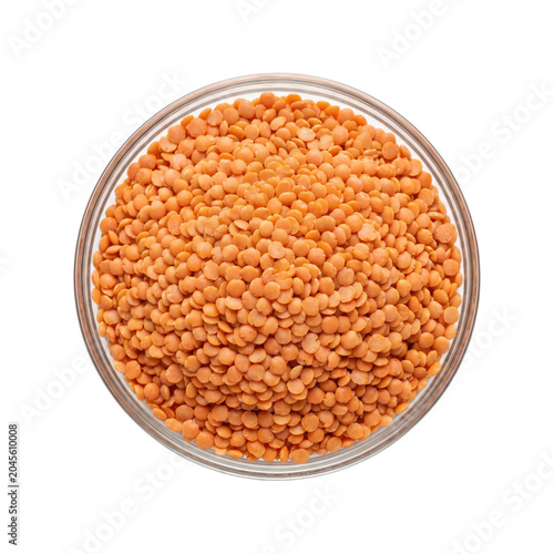 Red lentils in a glass bowl, top view, isolated on transparent background
