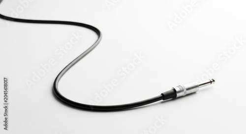 Audio cable with 14 inch jack connector isolated on white background