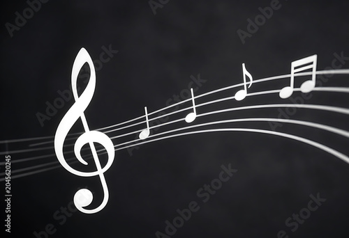Glowing white music notation symbols on a dark black background
