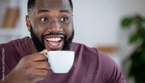 Person receiving unexpected good news from loved one, genuine emotional reaction