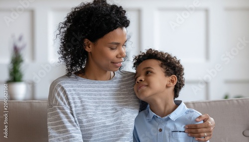 Mother comforting child after a difficult moment, emotional support