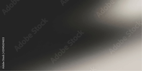 Foto A stark, atmospheric image rendered in monochromatic tones, with a subtle light source in the upper right corner casting a dramatic gradient across the darkness