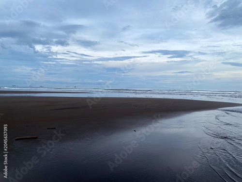 Photos sandbar formed on the surface of a shallow sea after the high tide receded following the storm