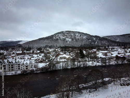 Bild auf Leinwand Dee river aerial view in Ballater by winter, Scotland
