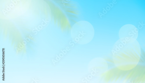 A serene tropical scene with palm trees shining brightly outdoors in a sunny landscape