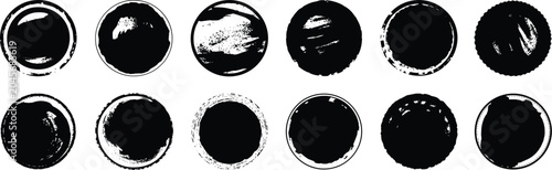 Obraz na plátně Set of twelve circular black rubber stamp impressions with distressed textures a