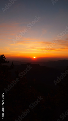 Golden Sunset Over Mountain Hills Landscape