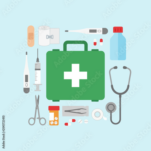 Quadro su tela Medical supplies and equipment arranged on a light blue background, flat lay