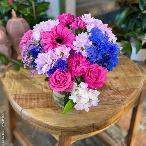 Bright Flower Arrangement on a Wooden Table in a Floral Shop