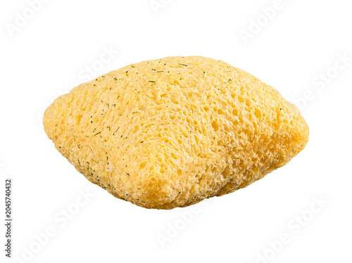 Fotografia Crispy pillow-shaped puffed snack, golden yellow, sprinkled with fresh green herbs