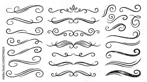 Photos Hand drawn ornamental flourish swirl divider set