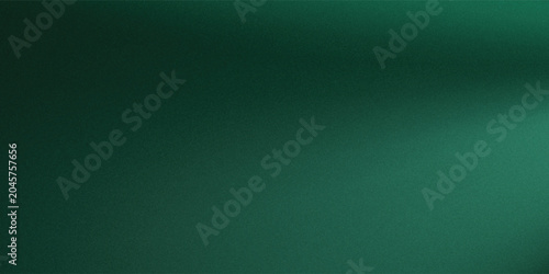 Obraz na płótnie An abstract background featuring a soft, dark green texture