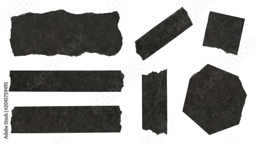 Foto Collection of black adhesive tape pieces with distressed edges.