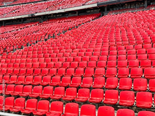 Rows of Red Plastic Stadium Seats in Sports Arena, Empty Football and Soccer Stadium Seating
