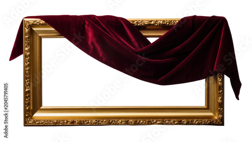 Foto Ornate golden picture frame draped with deep red velvet fabric, isolated on tran