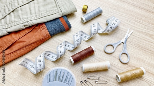 Canvastavla A top view of sewing supplies for mending and altering clothing