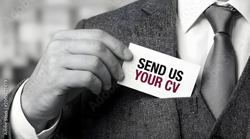 Businessman Offering Business Card with 'Send Us Your CV' Text for Job Application. Generated with AI