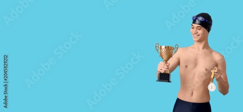 Young male swimmer in swim ...