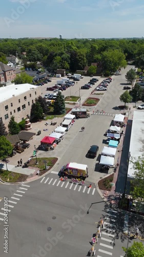 Vertical Drone Shot of a Vibrant Small-Town Festival
