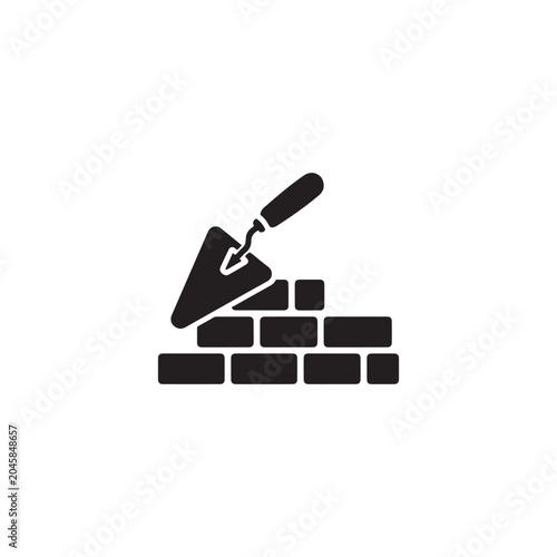Trowel and brick wall icon. Symbol of construction or building work. Vector Illustration