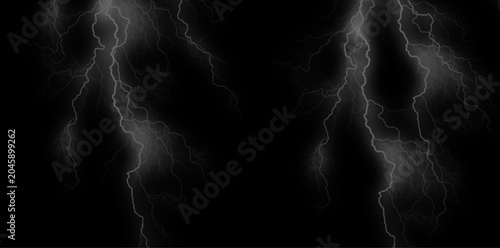 Lightning bolts on black background for dramatic and stormy weather concepts