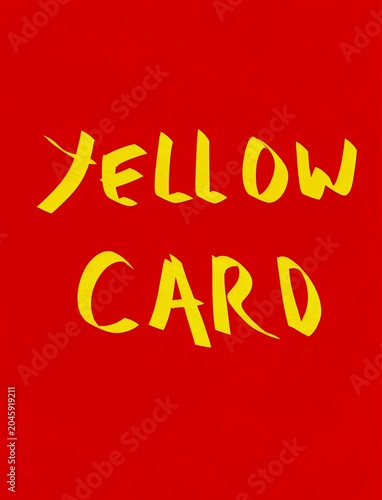 Yellow card text on a red background