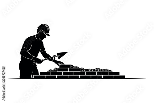 Tableau sur toile Construction worker silhouette a detailed black and white image of bricklaying a