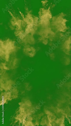 Explosive powder burst in vibrant yellow against a deep green background, outward radial expansion, symbolizing energetic release, creation, and transformation
