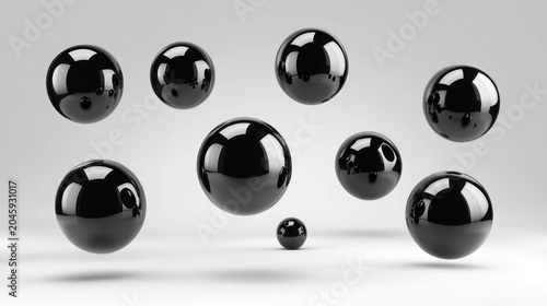 Floating black spheres on a light background