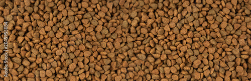 Dry pet food, dog kibble pile, puppy pellets, small canine protein croquette meal, animal food