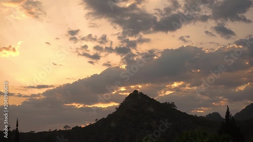 Time-Lapse of Clouds Over Mountains at Sunset, Tropical Sky