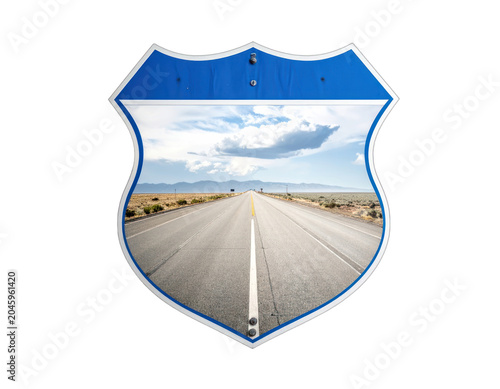 A shield-shaped sign framing a highway stretching into the distance.