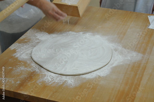 Japanese soba. The dough is kneaded and rolled out. It’s not pizza.
