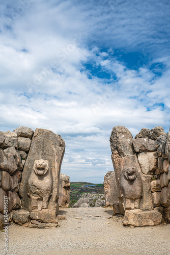 Architectural view of the famous stone-carved Lion Gate at the ancient ruins of Hattusa. The monumental gate represents the master masonry and artistic achievements of the Hittite civilization in Anat