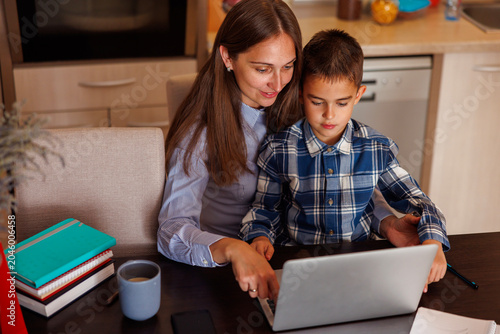 Mother homeschooling son