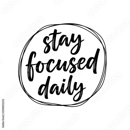 Handwritten stay focused daily motivational quote in circular frame
