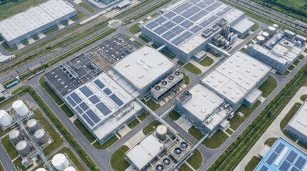 Industrial factory plant complex overhead view, large-scale infrastructure scene with strong geometry, production facilities and commercial utility in a clean aerial composition, soft natural light,