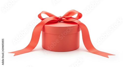 Red round gift box with a ribbon bow isolated on white background