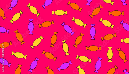 Colorful wrapped candy pattern on a pink background