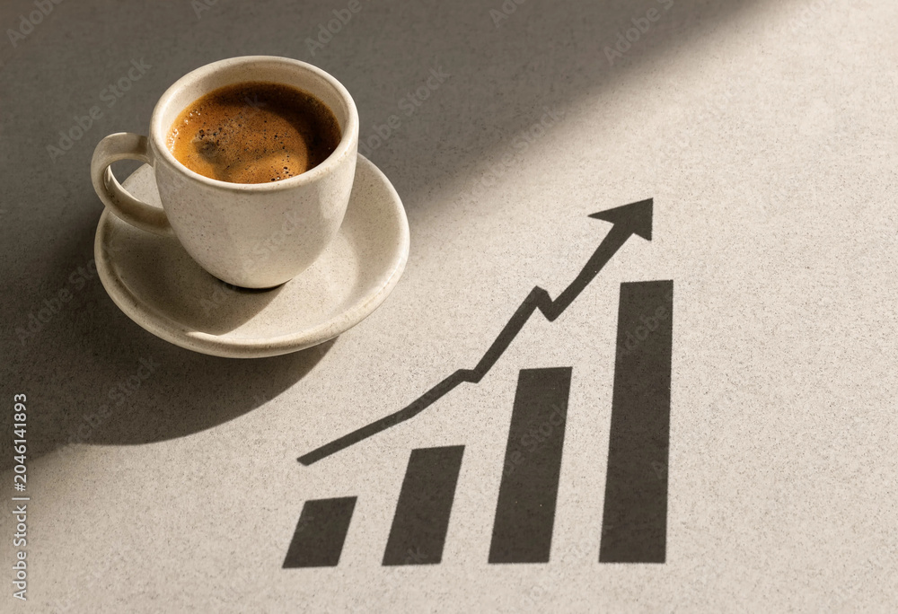 Cup of Espresso Coffee with Financial Growth Chart Graphic
