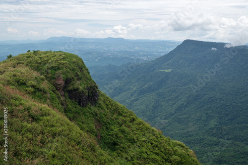 Beautiful landscape with mountains. Rainforest ecosystem and healthy environment concept background. Top view forest and mountain in Thailand. Nature background.
